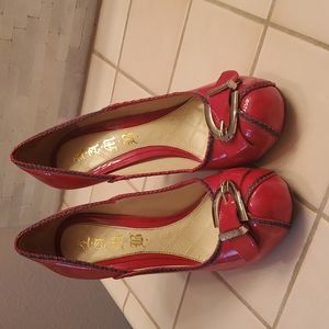 L.A.M.B red and black high heels                  * Lather sole and buckle